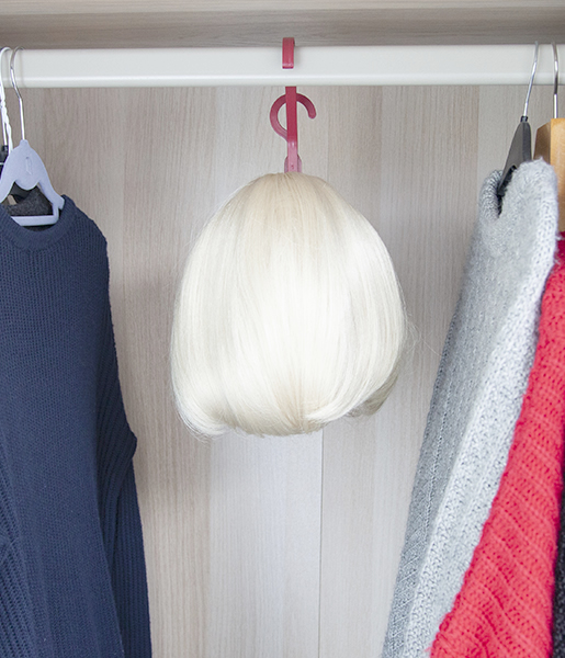 wig hanger in wardrobe